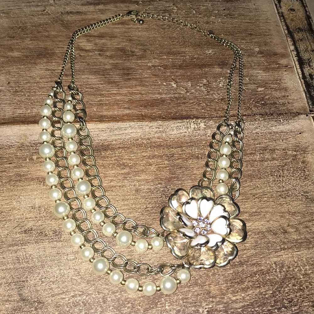 White flower and pearl necklace